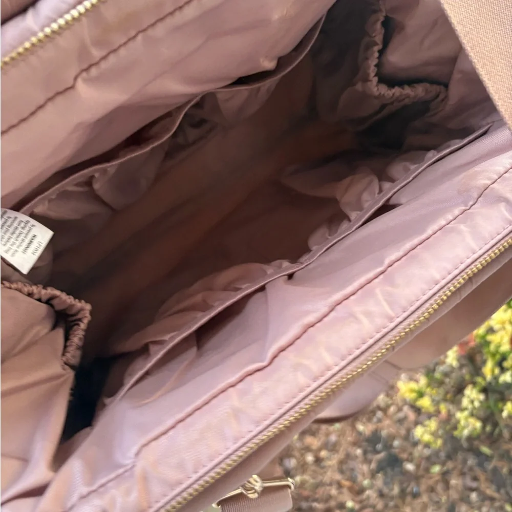 Pre owned Happ Brand Paige Caryall Diaper bag slight stain I can see in pic